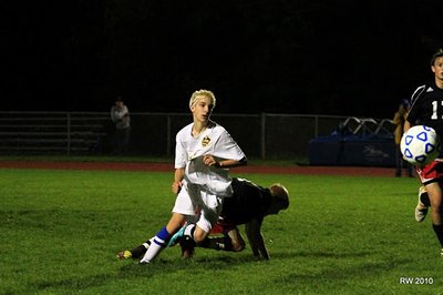 Senior winger Troy Hradisky pursues a loose ball in the Bobcats’ offensive zone versus Groton High School. soccer20110930 Troy Groton