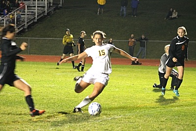 Shea McCartney scores Lansing's third goal after dribbling past the goalkeeper. girlssoccer20141010