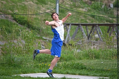 Presthus throwing the discus, and Roarke (above) high jumping trackpresthusdiscus