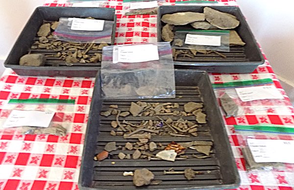 Artifacts found around the school in an ongoing archaeological program Artifacts