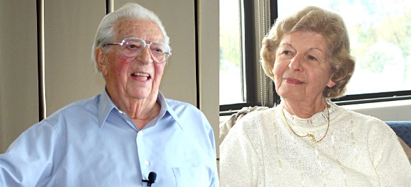 Fred and Ilse Voss, whose own family was driven from their home to live in a synagogue in Vienna until it was set on fire on Krisallnacht, at Lansing High School in 2012.  Over many years Voss, now 99, told his story to hundreds of teenagers, who learned that their lives were quite different from Voss's when he was a teen in Germany during the Holocaust. fredandilsavoss 2012