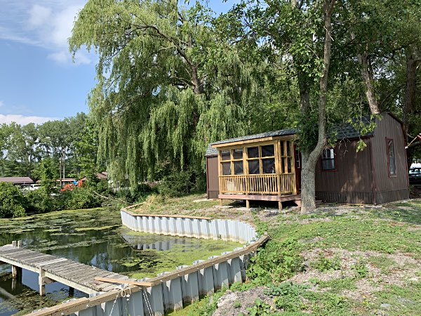 Cabins come in one or two bedrooms, and include a boat slip. The Myers Park marina can be seen across the water from the cabins. FLMS Cabin